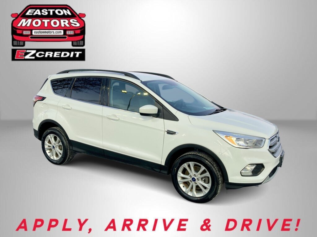 Easton Motors EZ Credit logo in the top-left corner with a white SUV beneath and 'APPLY, ARRIVE & DRIVE!' in red at the bottom.