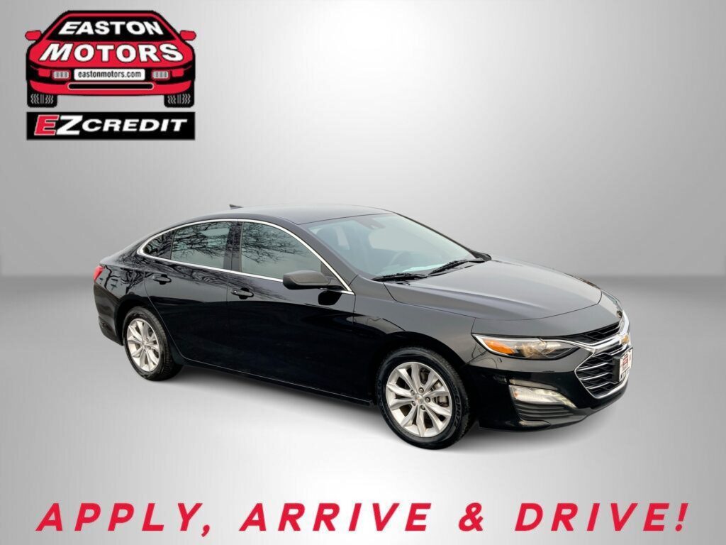 Black sedan showcased on a gray gradient backdrop with Easton Motors EZCredit logo in the top-left corner and red 'APPLY, ARRIVE & DRIVE!' text along the bottom.