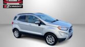 Advertisement showing a silver SUV with Easton Motors logo and EZCredit branding on a gray gradient background.