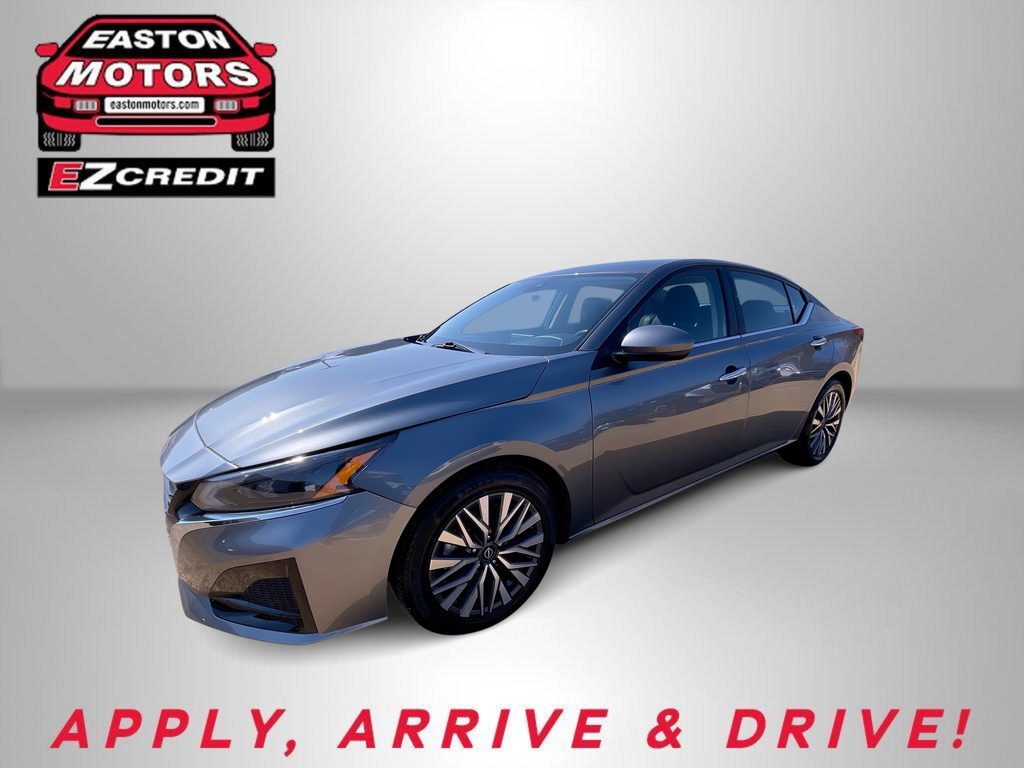 Blue sedan on a gray stage with Easton Motors EZCredit logo in the top-left and the slogan 'APPLY, ARRIVE & DRIVE!' at the bottom.