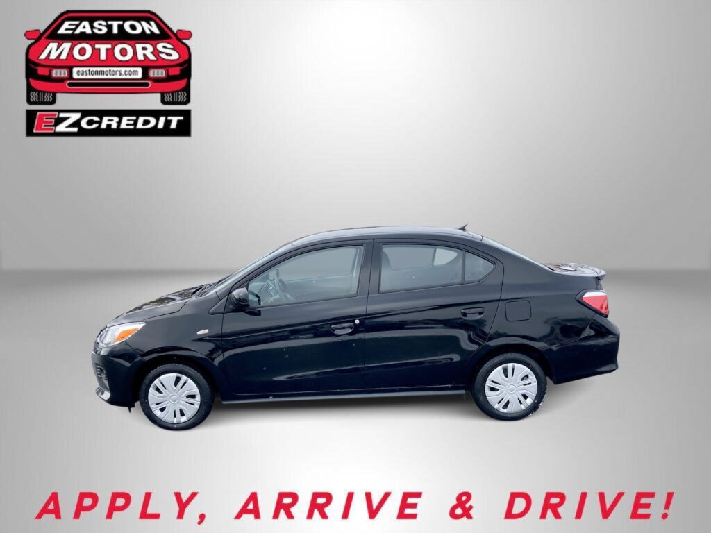 Black sedan on a gray backdrop with Easton Motors EZ Credit logo in the top-left and 'APPLY, ARRIVE & DRIVE!' at the bottom text.