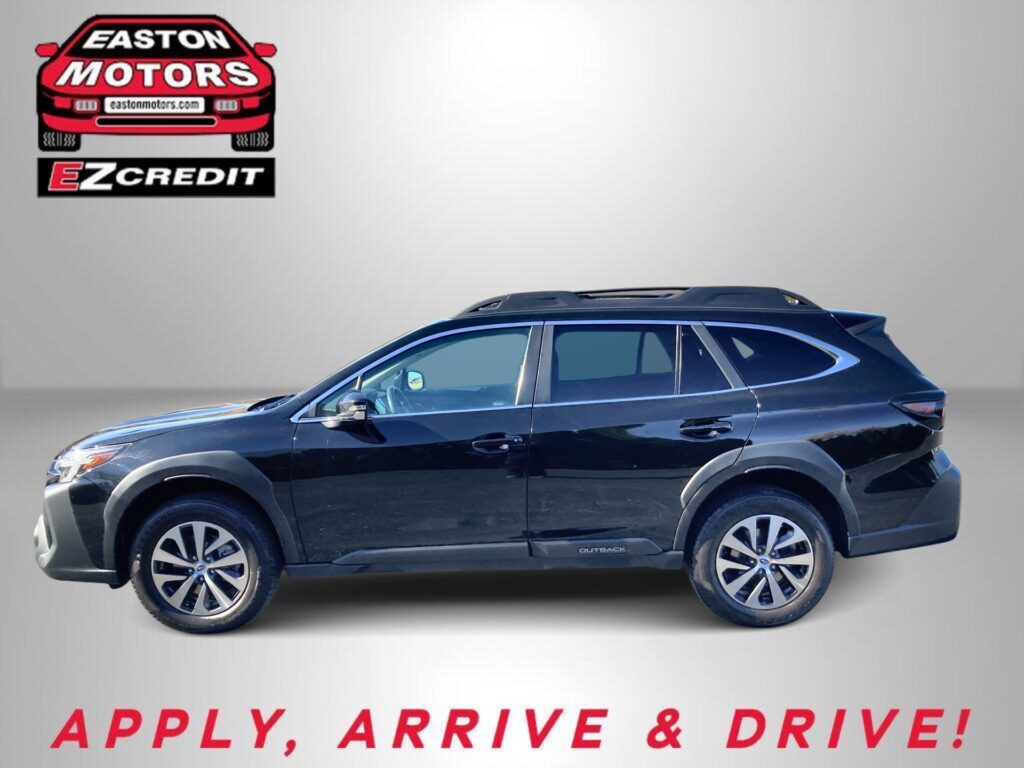 Blue SUV on a gray background with an EZCredit logo in the upper left and the slogan 'APPLY, ARRIVE & DRIVE!' at the bottom