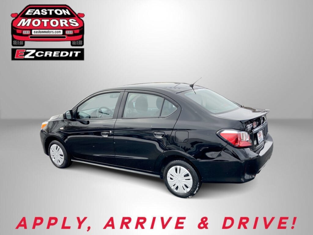 Black sedan with Easton Motors EZ Credit branding in a promotional banner, and the slogan 'APPLY, ARRIVE & DRIVE!' in red text at the bottom.