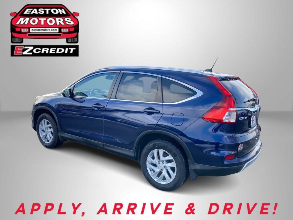 Blue SUV shown in a promotional banner with Easton Motors and EZ Credit branding in the top-left and the red slogan 'APPLY, ARRIVE & DRIVE!' at the bottom.