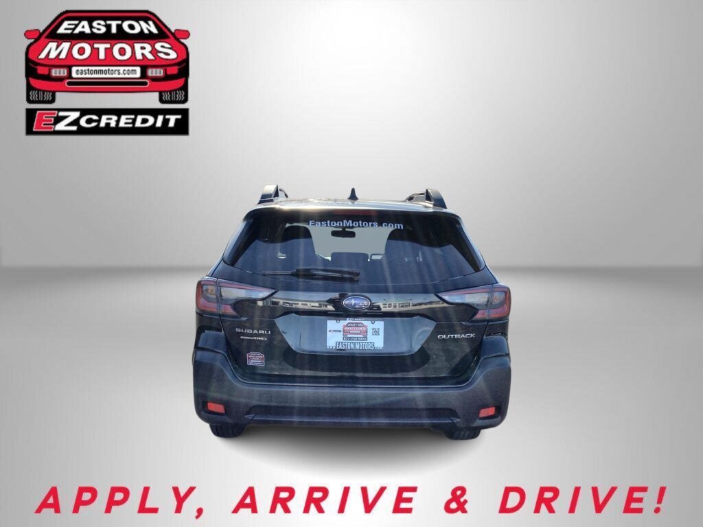 Rear view of a dark SUV with Easton Motors branding visible on the top left and the slogan 'APPLY, ARRIVE & DRIVE!' at the bottom.