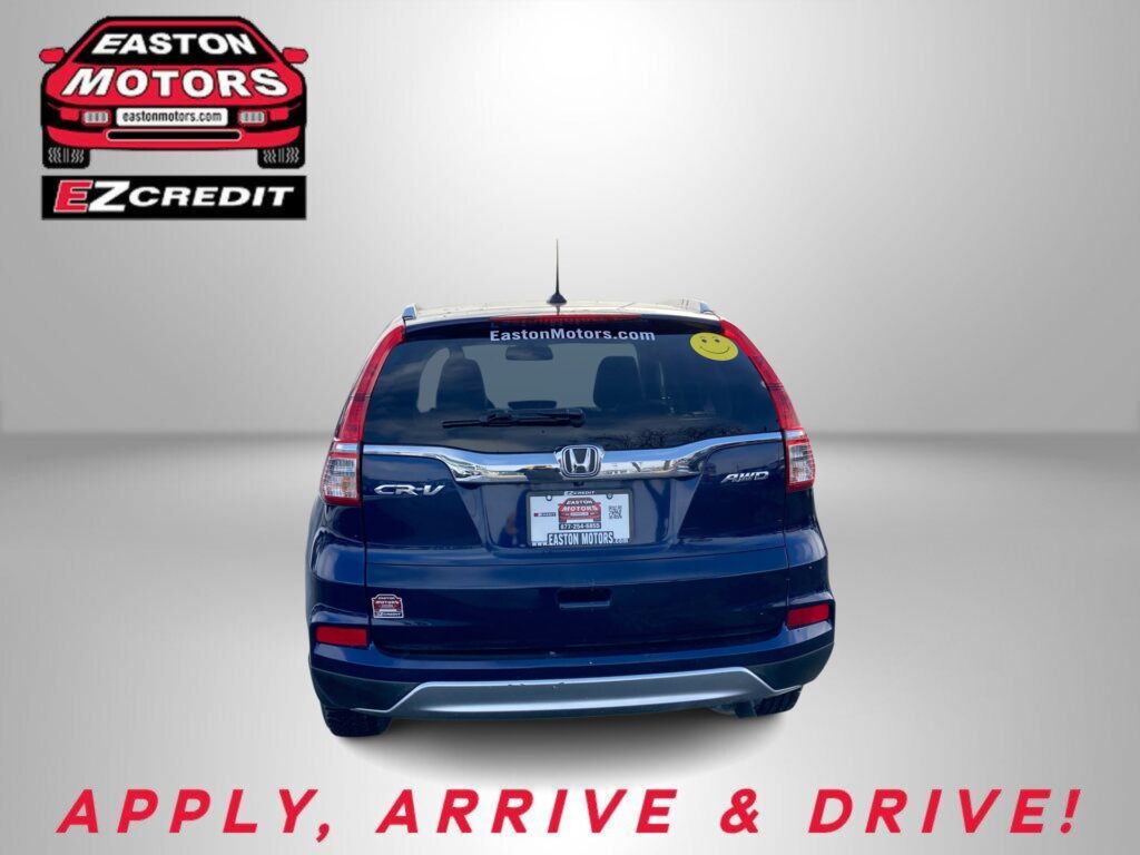 Rear view of a blue Honda CR-V displaying Easton Motors branding on the back with the slogan 'APPLY, ARRIVE & DRIVE!' at the bottom
