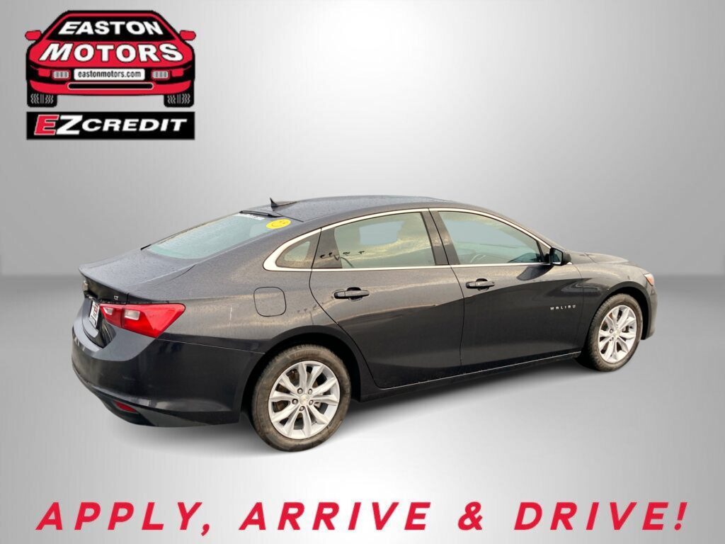 Gray sedan with Easton Motors EZ Credit logo in the top-left and the words “APPLY, ARRIVE & DRIVE!” below the car, on a gray backdrop.