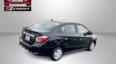 Black sedan shown from the rear side with Easton Motors branding in the top-left and the slogan 'APPLY, ARRIVE & DRIVE!' in red text on a gray background.