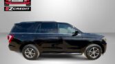 Black SUV in profile with Easton Motors EZ Credit logo in the upper left; ad-style background and the slogan 'APPLY, ARRIVE & DRIVE!' at the bottom.