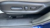 Car seat side controls: a horizontal switch and a vertical switch for adjusting seat position and lumbar support panel on a black plastic housing.