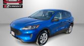 Blue Ford SUV showcased in a dealership ad with Easton Motors logo on a light gray background and the slogan 'Apply, Arrive & Drive'.