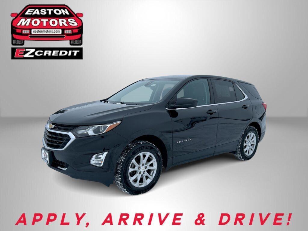 Dark blue SUV shown in a studio setting with an Easton Motors EZCredit logo in the top left and the slogan 'APPLY, ARRIVE & DRIVE!' at the bottom.