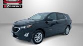 Dark blue SUV shown in a studio setting with an Easton Motors EZCredit logo in the top left and the slogan 'APPLY, ARRIVE & DRIVE!' at the bottom.