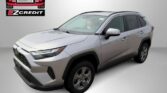Front three-quarter view of a silver SUV in a dealership ad, showcasing Easton Motors branding and EZCredit with the call to action 'APPLY, ARRIVE & DRIVE!'
