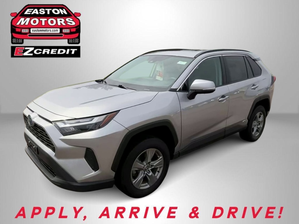 Front three-quarter view of a silver SUV in a dealership ad, showcasing Easton Motors branding and EZCredit with the call to action 'APPLY, ARRIVE & DRIVE!'
