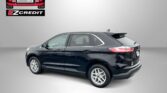 Black SUV on a gray studio backdrop with an Easton Motors logo in the top-left and the slogan 'APPLY, ARRIVE & DRIVE!' along the bottom.
