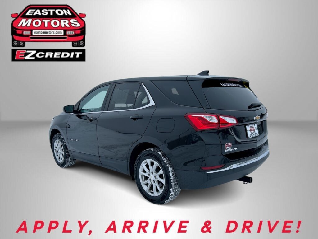 Advertisement for Easton Motors EZCredit featuring a dark Chevrolet Equinox with the Easton Motors logo in the top left and the slogan “APPLY, ARRIVE & DRIVE!” at the bottom.