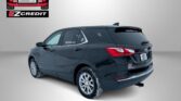 Advertisement for Easton Motors EZCredit featuring a dark Chevrolet Equinox with the Easton Motors logo in the top left and the slogan “APPLY, ARRIVE & DRIVE!” at the bottom.