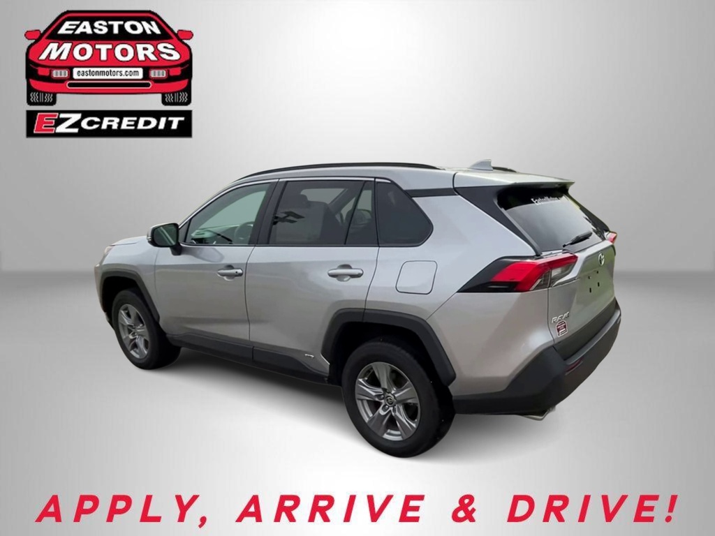 Silver SUV shown from a rear three-quarter view, with Easton Motors EZ Credit logo in the corner and the 'APPLY, ARRIVE & DRIVE!' slogan.