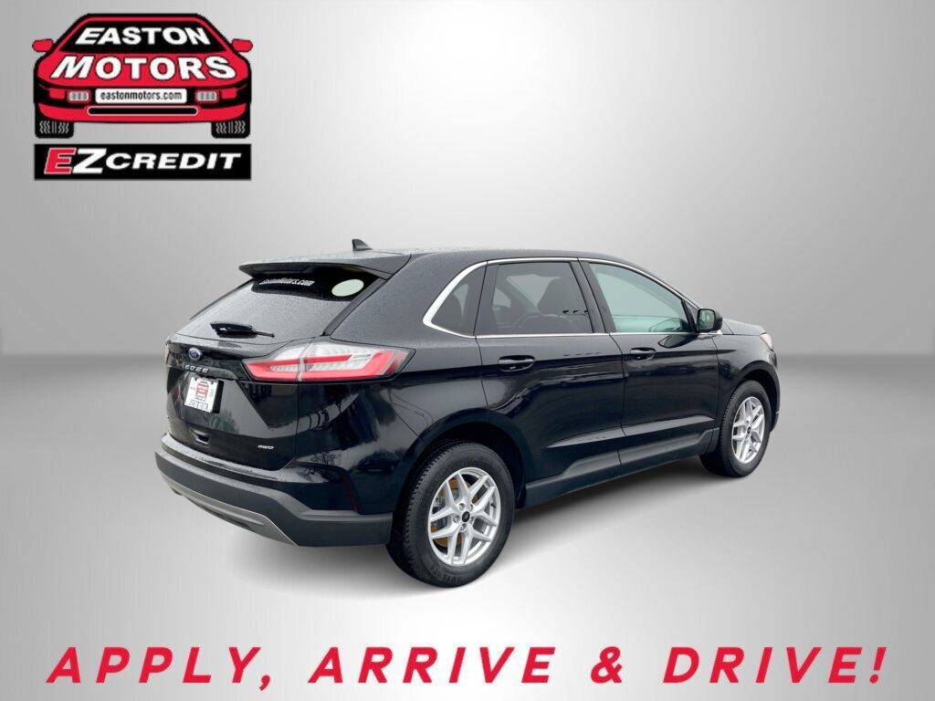 Dark SUV from the rear-right side against a gray gradient with Easton Motors logo and EZ Credit branding in the top left; slogan 'APPLY, ARRIVE & DRIVE!' at the bottom.