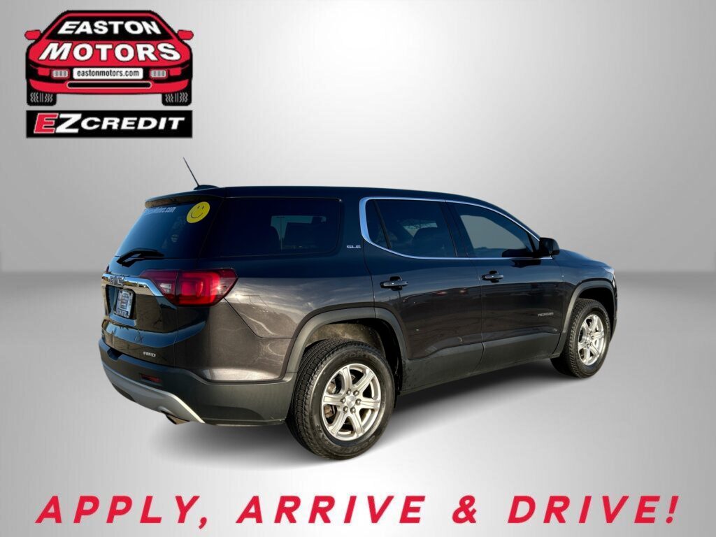 Dark SUV in a studio with Easton Motors EZCredit logo in the top left and 'APPLY, ARRIVE & DRIVE!' caption below.