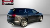Dark SUV in a studio with Easton Motors EZCredit logo in the top left and 'APPLY, ARRIVE & DRIVE!' caption below.