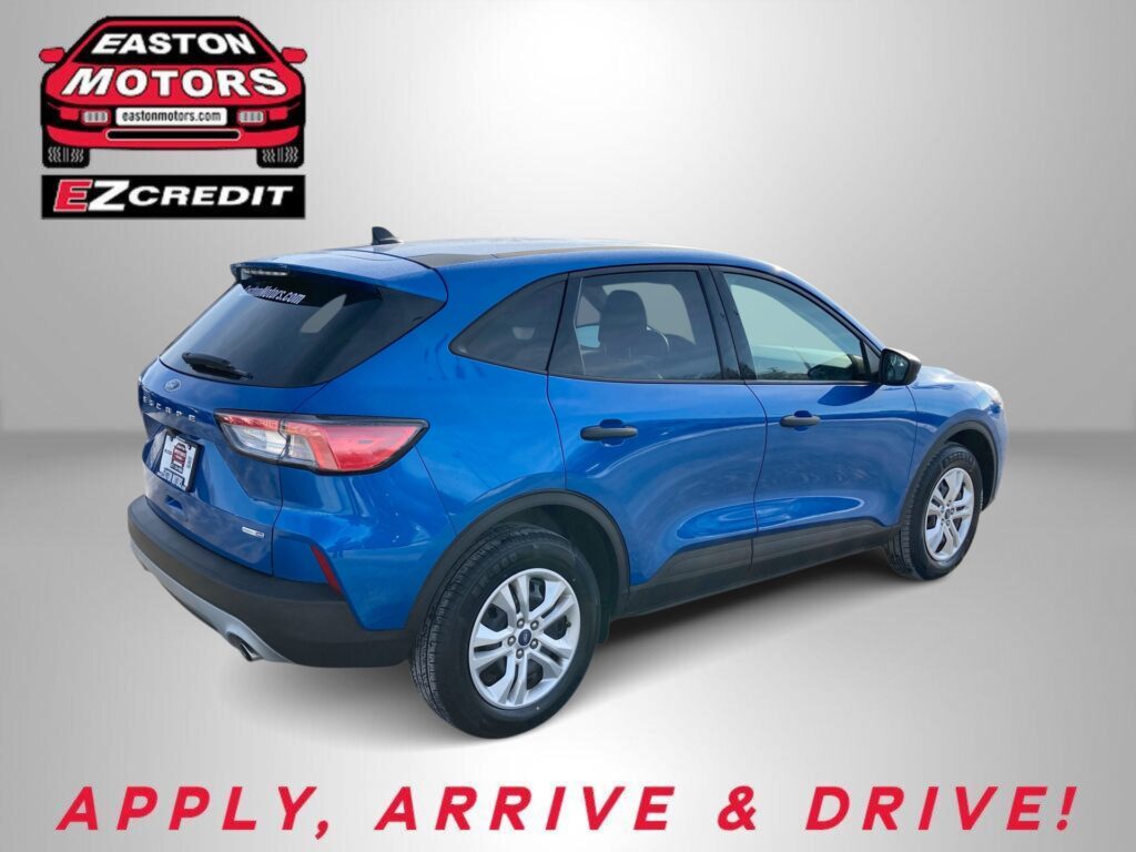 Blue SUV in a studio setting with Easton Motors EZCredit logo in the upper left and 'APPLY, ARRIVE & DRIVE!' slogan.