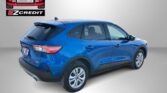 Blue SUV in a studio setting with Easton Motors EZCredit logo in the upper left and 'APPLY, ARRIVE & DRIVE!' slogan.