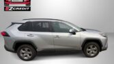 Side profile of a silver SUV shown indoors with Easton Motors logo in the top-left and 'APPLY, ARRIVE & DRIVE!' text along the bottom.