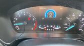 Car instrument cluster showing 82,601.4 miles and 0 mph, gear selector in Park, with tachometer and speedometer visible.