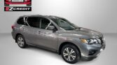 Gray SUV in a studio with Easton Motors EZCredit logo; slogan at bottom reads 'APPLY, ARRIVE & DRIVE!'