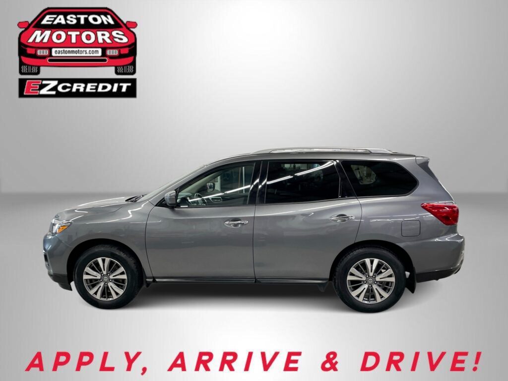 Gray SUV in a studio with Easton Motors EZ Credit logo in the top left and the slogan 'APPLY, ARRIVE & DRIVE!' at the bottom.