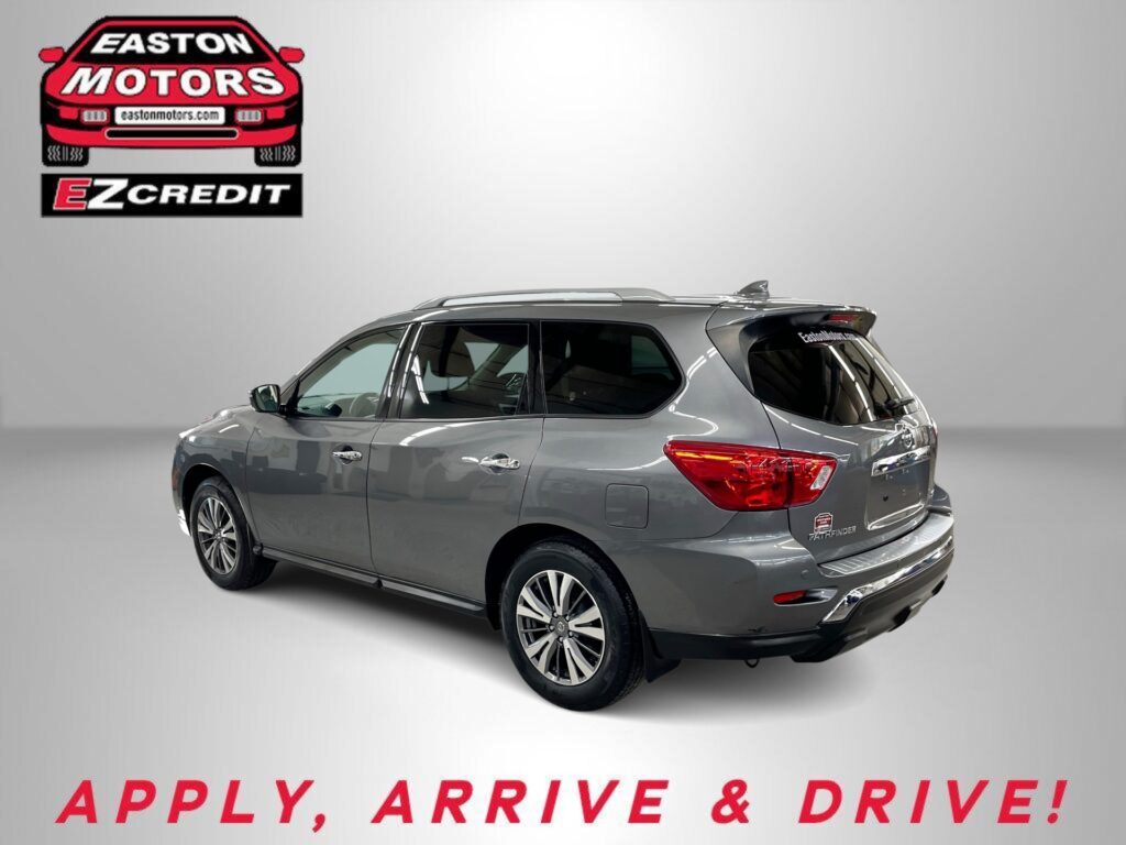 Gray SUV photographed in a studio with Easton Motors logo in the upper left and the slogan 'APPLY, ARRIVE & DRIVE!' at the bottom