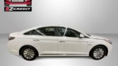 White sedan shown in profile on a gray backdrop; Easton Motors EZCredit logo in the top-left with the slogan 'APPLY, ARRIVE & DRIVE!'