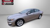 Grey four-door sedan on a light backdrop with Easton Motors EZCredit logo in the top-left and the slogan 'APPLY, ARRIVE & DRIVE!' in red text at the bottom.