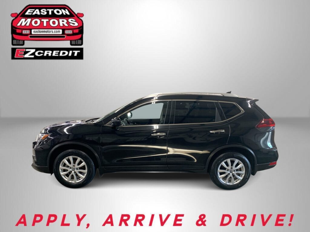 Black SUV displayed against a gray backdrop with Easton Motors EZCredit logo in the top-left corner and 'APPLY, ARRIVE & DRIVE!' text at the bottom.