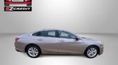 Beige four-door sedan on a light gray background with Easton Motors EZ Credit logo in the top left and slogan 'APPLY, ARRIVE & DRIVE!' at the bottom.