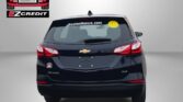 Rear view of a black Chevrolet Equinox AWD at Easton Motors with EZCredit logos and the slogan 'APPLY, ARRIVE & DRIVE!' text