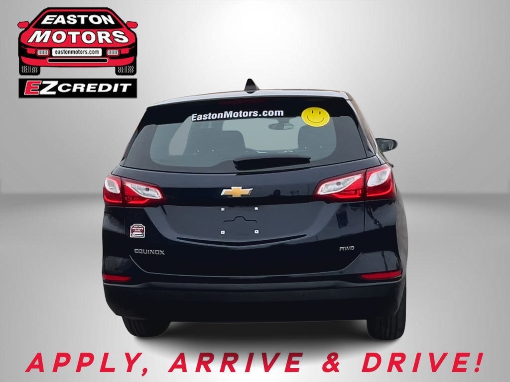 Rear view of a black Chevrolet Equinox AWD at Easton Motors with EZCredit logos and the slogan 'APPLY, ARRIVE & DRIVE!' text