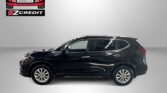 Black SUV in a studio setting with Easton Motors logo and EZCredit branding on the wall; promotional text visible at bottom: Apply, Arrive & Drive.