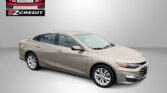 Beige sedan shown in a promotional banner with the Easton Motors logo and 'EZ Credit' at top left and 'APPLY, ARRIVE & DRIVE!' in red text at bottom.