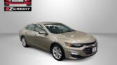 Beige sedan on a gray backdrop with Easton Motors logo in the upper left and 'APPLY, ARRIVE & DRIVE!' text along the bottom.