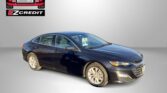 Blue sedan in a studio setting with Easton Motors logo and EZCredit banner in the upper left, and 'APPLY, ARRIVE & DRIVE!' text at the bottom.