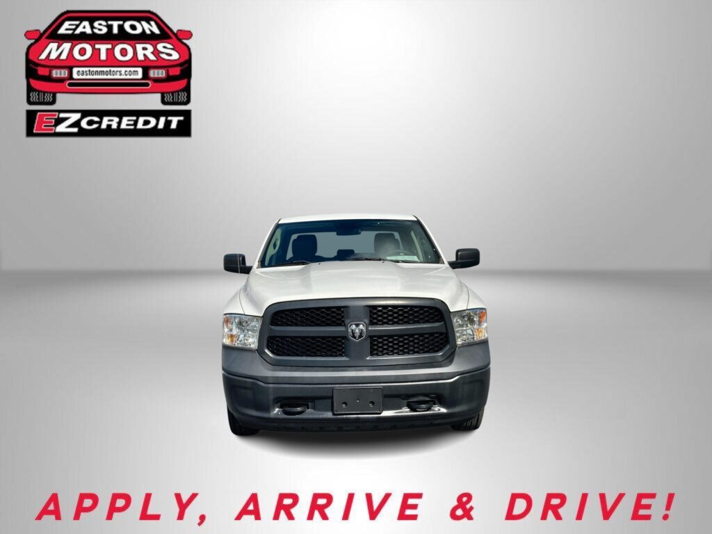 Front view of a white pickup truck against a gray gradient, Easton Motors logo in the upper left and the red slogan 'APPLY, ARRIVE & DRIVE!' at the bottom.