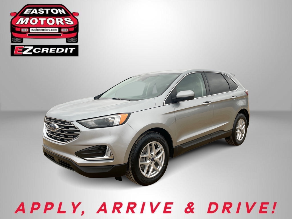 Silver Ford SUV in a dealership promo image with Easton Motors EZCredit logo and the caption 'APPLY, ARRIVE & DRIVE' in red text on the bottom of the image.