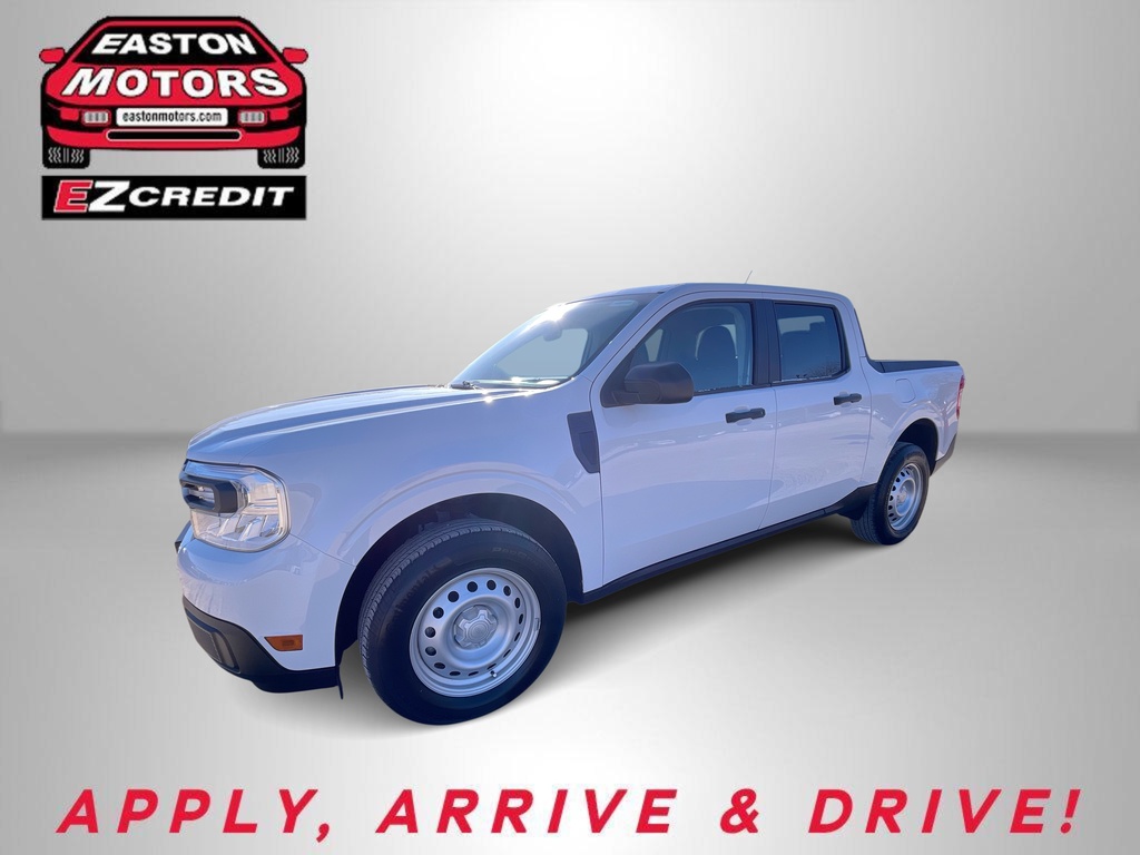 White pickup truck on a dealership backdrop with Easton Motors and EZCredit logos visible; slogan 'APPLY, ARRIVE & DRIVE' shown below.
