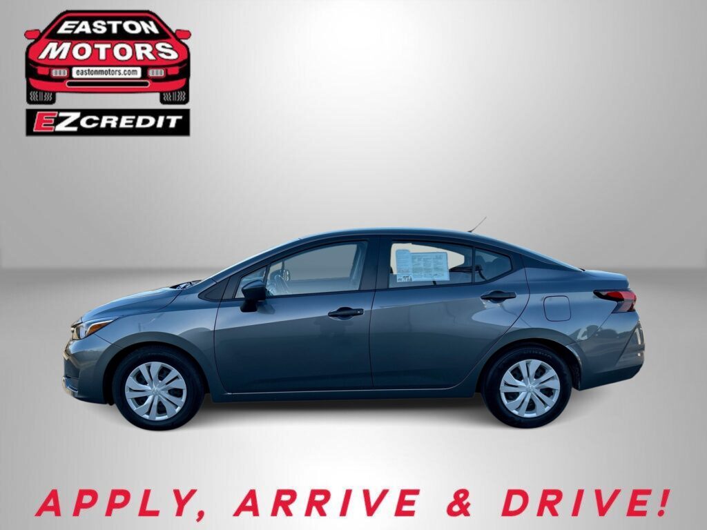EZCredit advertisement featuring a blue sedan beneath the Easton Motors EZCredit logo on a gray gradient background.
