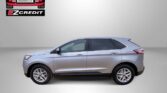 Advert for Easton Motors: silver SUV on a gray background with EZCredit logo; slogan 'Apply, Arrive & Drive!' at bottom