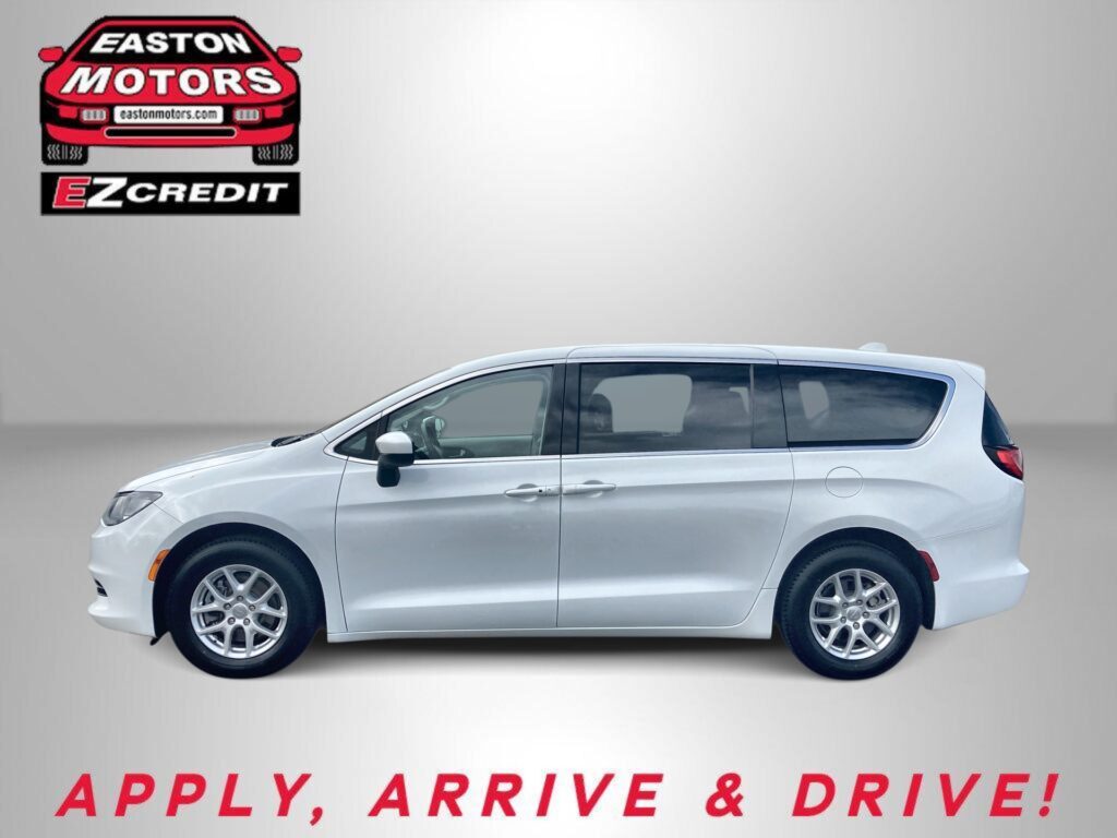 Silver minivan shown in profile with Easton Motors EZCredit logo at top left and the slogan 'APPLY, ARRIVE & DRIVE!' beneath