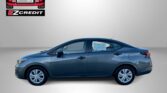 EZCredit advertisement featuring a blue sedan beneath the Easton Motors EZCredit logo on a gray gradient background.